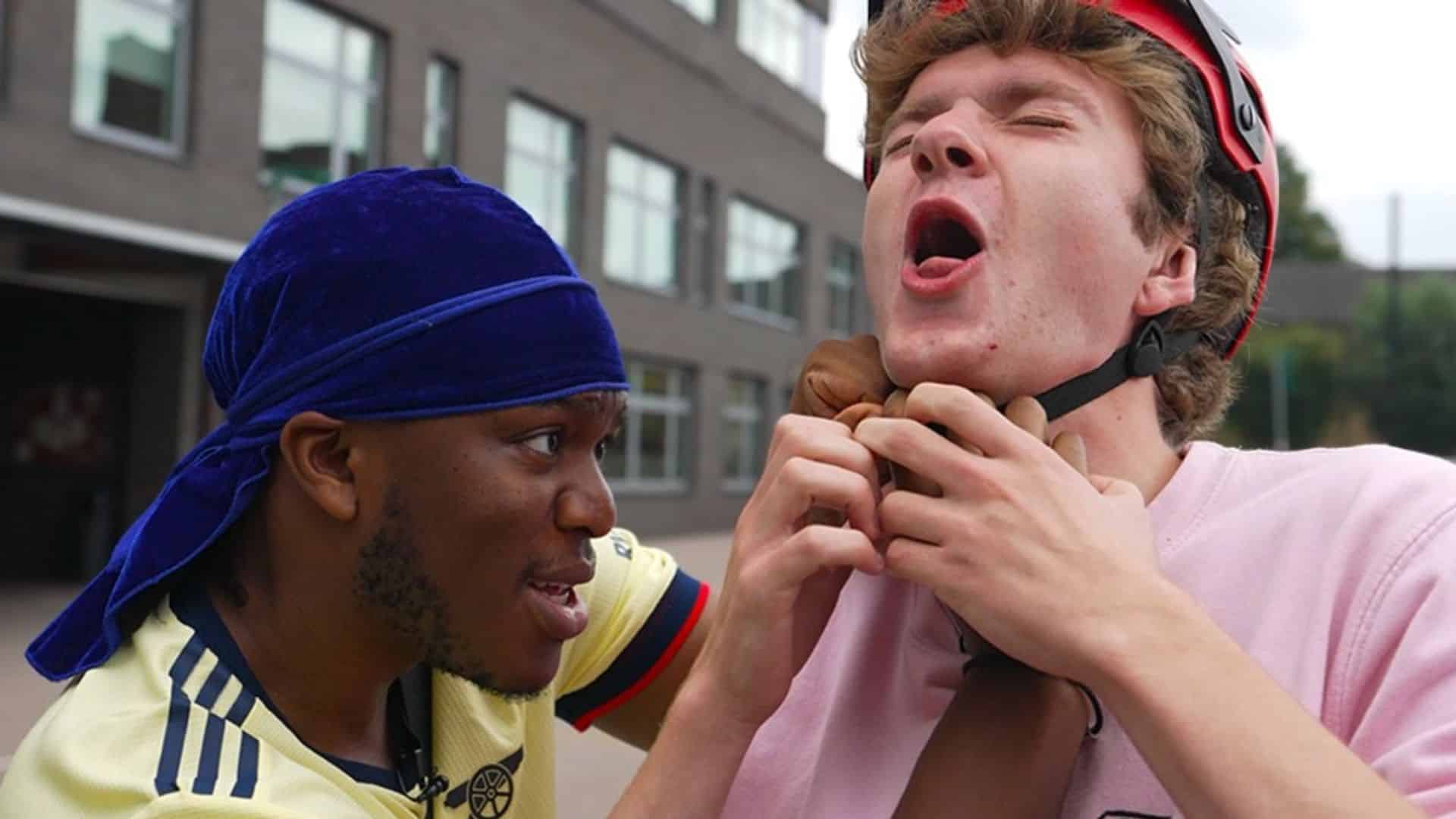 KSI putting a bike helmet on tommyInnit