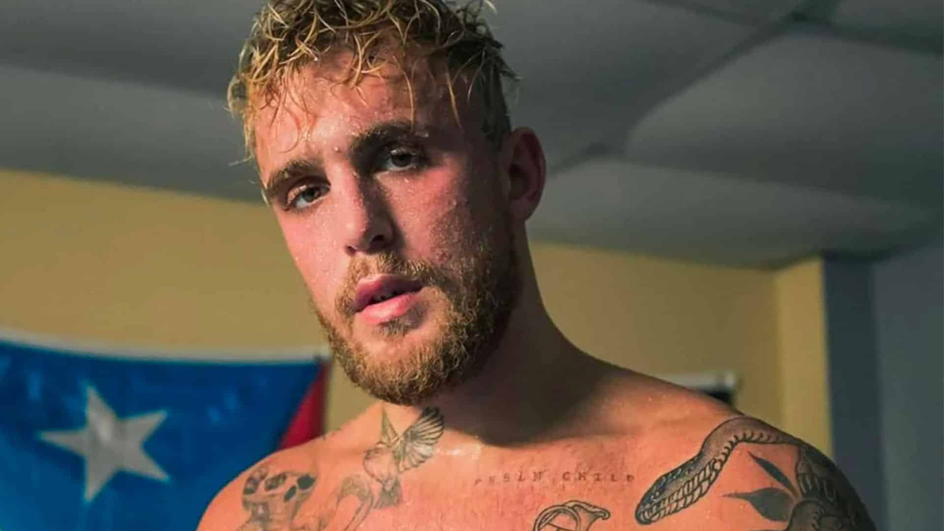 Jake Paul staring at camera in boxing gym