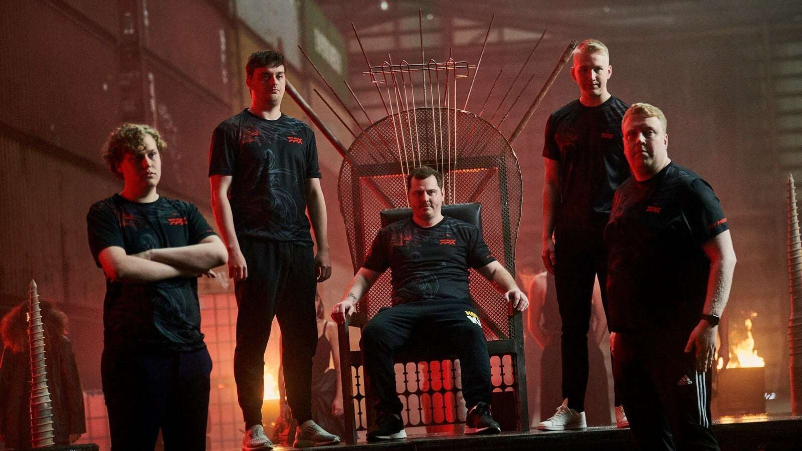 FPX team with ANGE1 sitting in a thrown surrounded by teammates at Masters Copenhagen