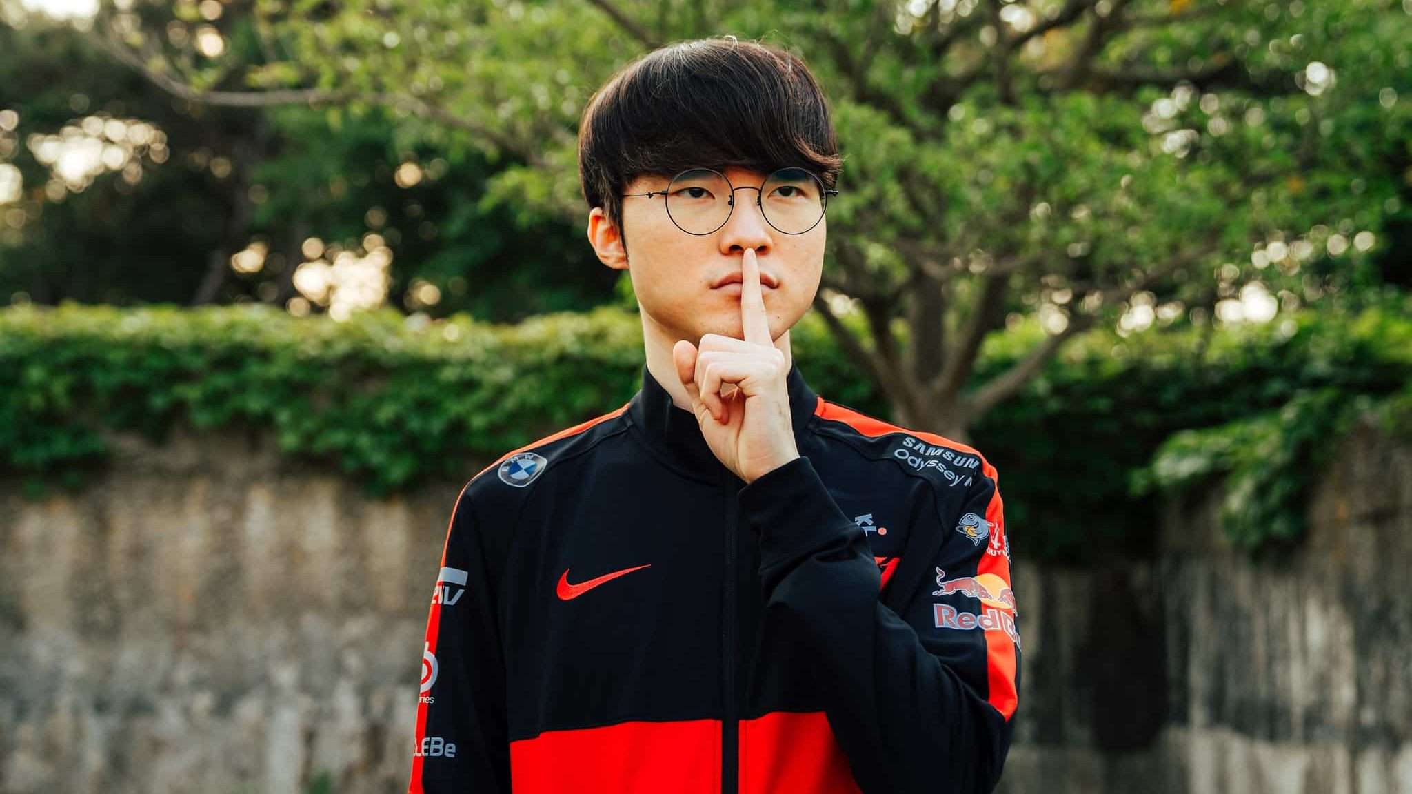 Faker holding up hushed finger