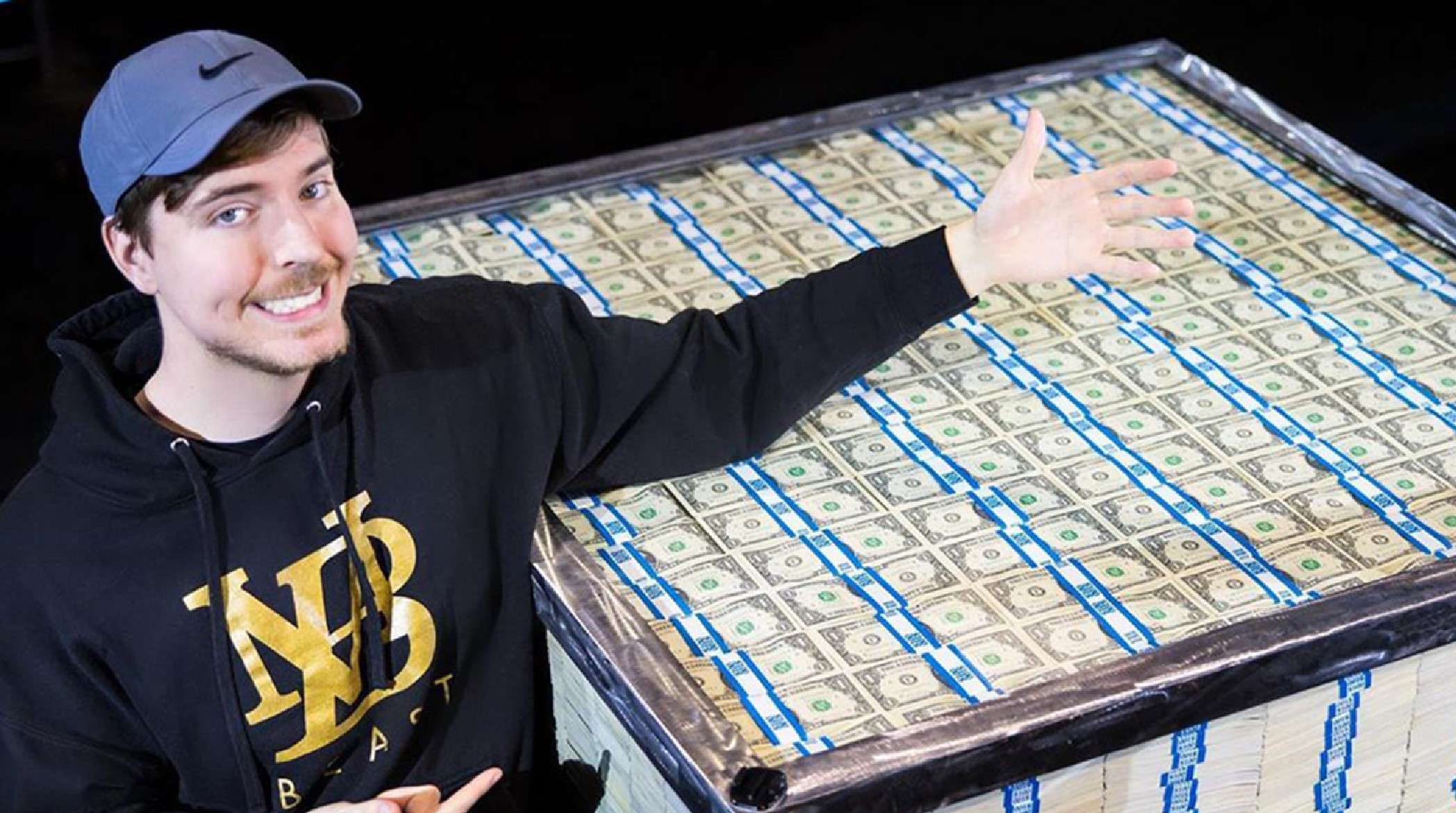 MrBeast next to money