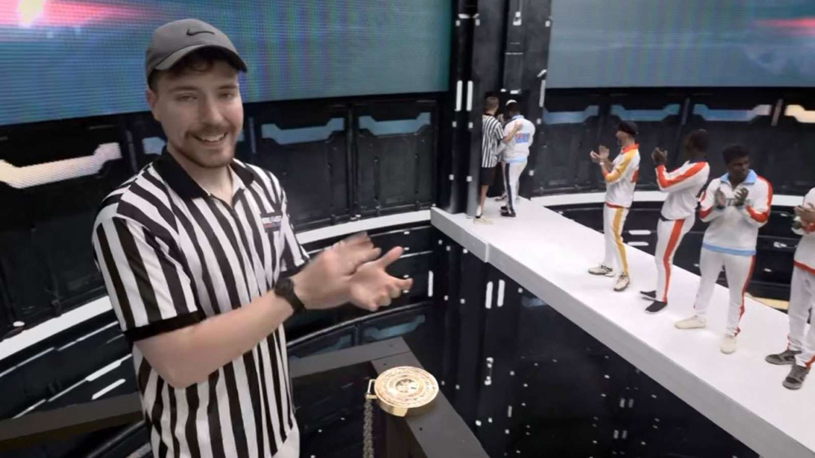 MrBeast wearing black and white referee strip