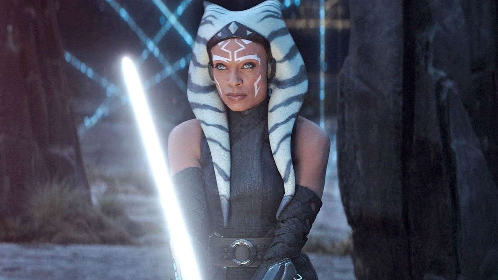 Rosario Dawson brandishing a lightsaber as Ahsoka.