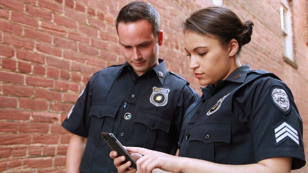 Police officers on phone