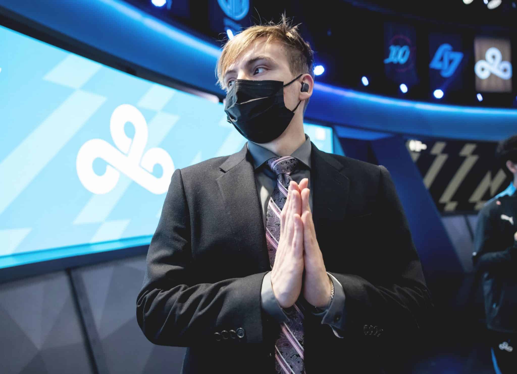 Cloud9 coach LS praying on stage at LCS Spring 2022