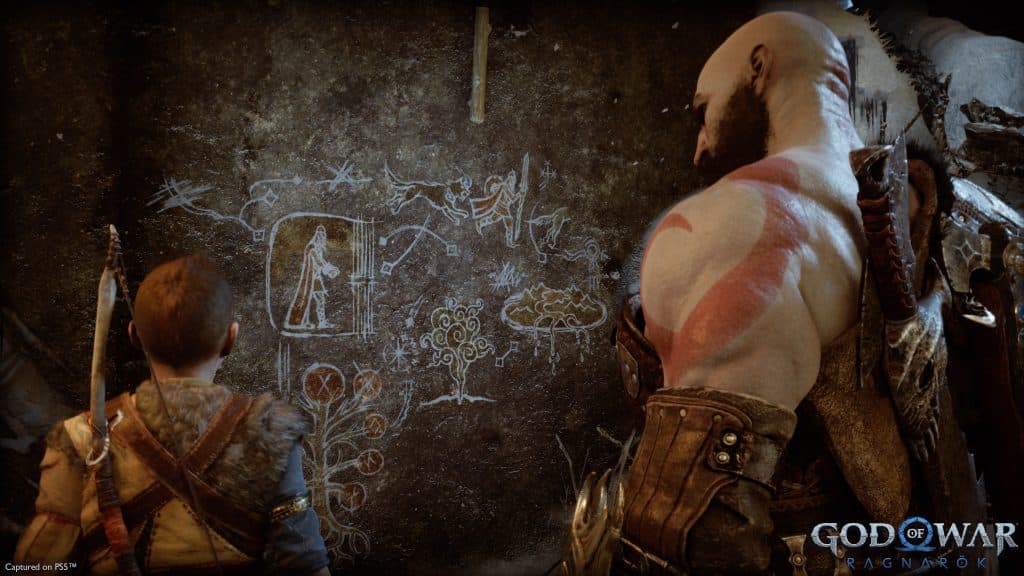 Kratos and Atreus reading prophecies in God of War Ragnarok