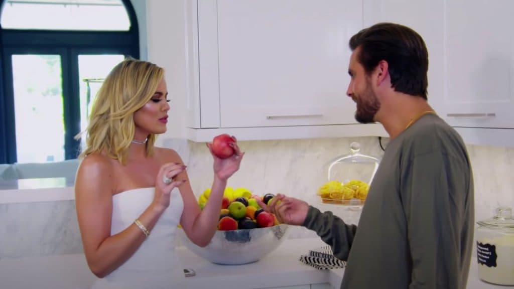 Khloe Kardashian and Scott Disick talking in the kitchen