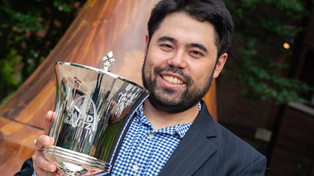 gmhikaru with chess trophy