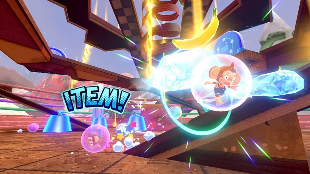 A screenshot from Super Monkey Ball Banana Rumble shows a monkey being hit by an item