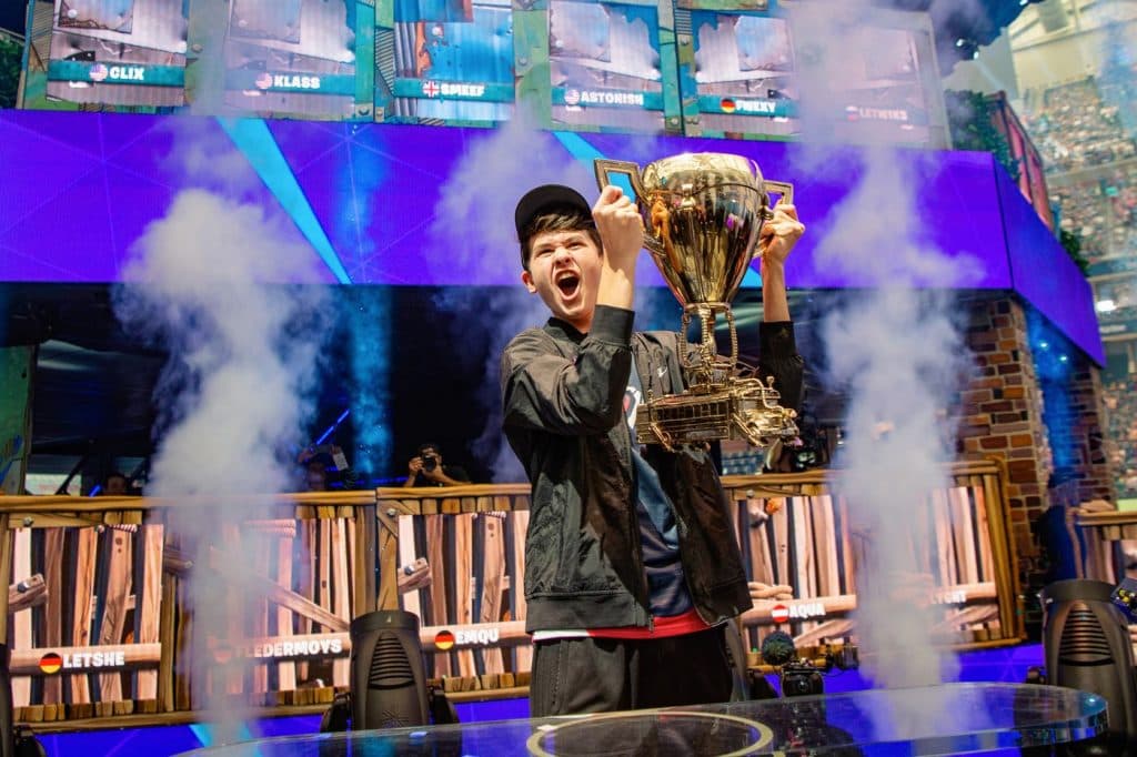 Bugha lifting Fortnite World Cup trophy