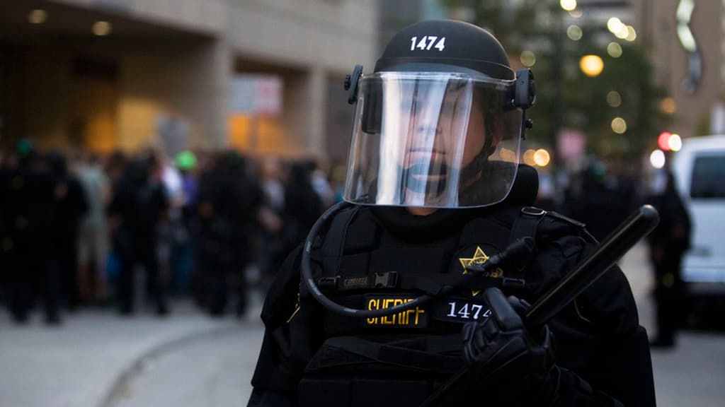 Police officer in riot gear