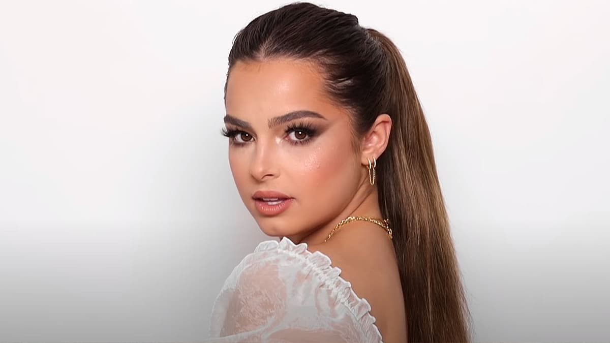 Addison Rae poses in makeup done by James Charles