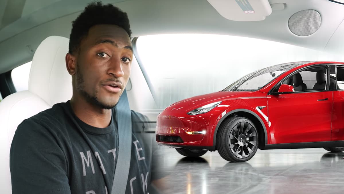 Marques Brownlee next to Tesla Model Y