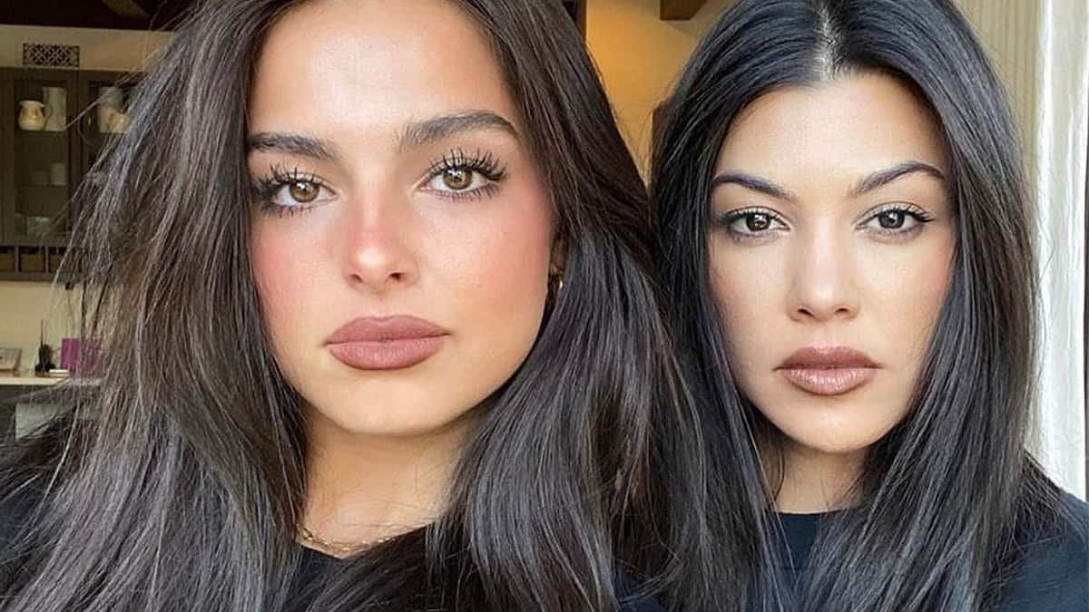 Addison Rae and Kourtney Kardashian pose side-by-side for a selfie.