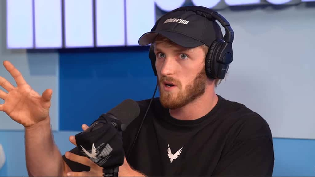 Logan Paul in Maverick tee and hat on Impaulsive podcast.