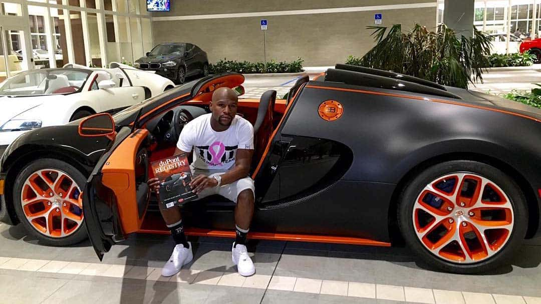 Floyd Mayweather with Bugatti Grand Sport Vitesse