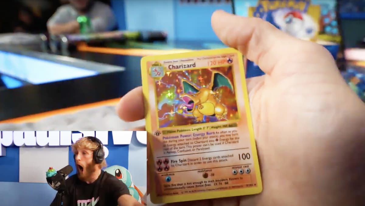 logan paul pulling charizard pokemon card