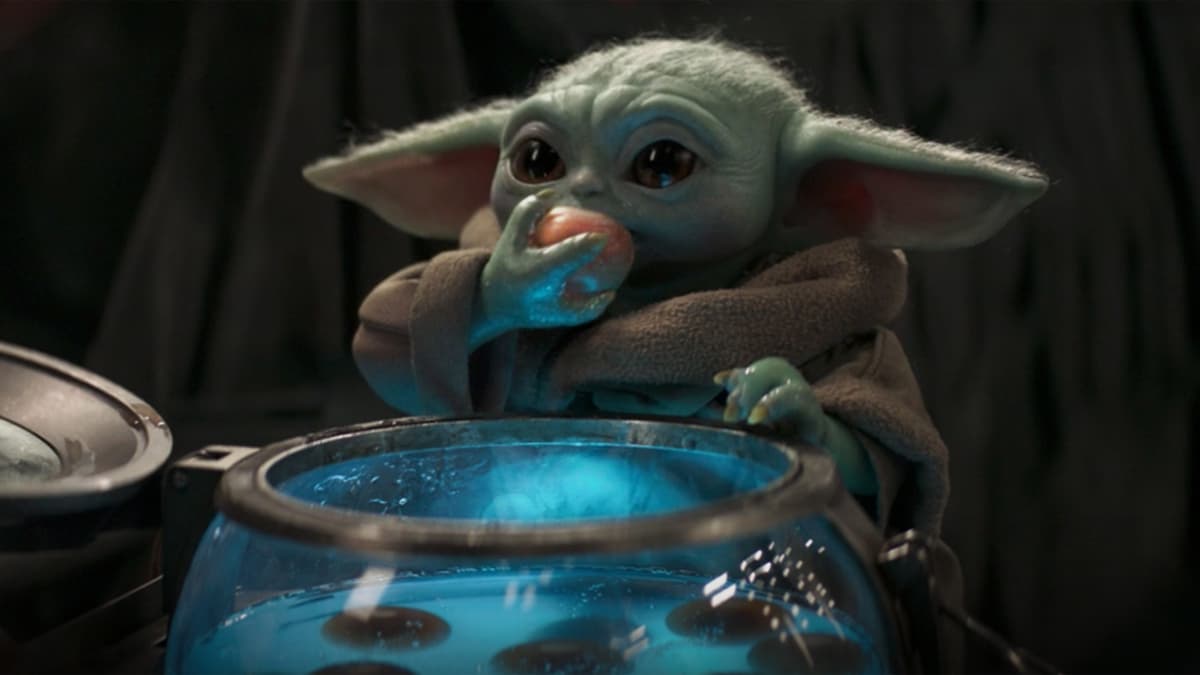 Baby Yoda eating eggs in The Mandalorian