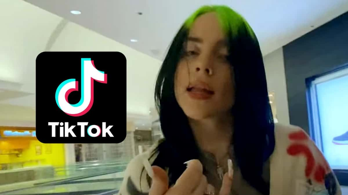 Billie Eilish looks at the camera in the Therfore I Am music video, next o the TikTok logo