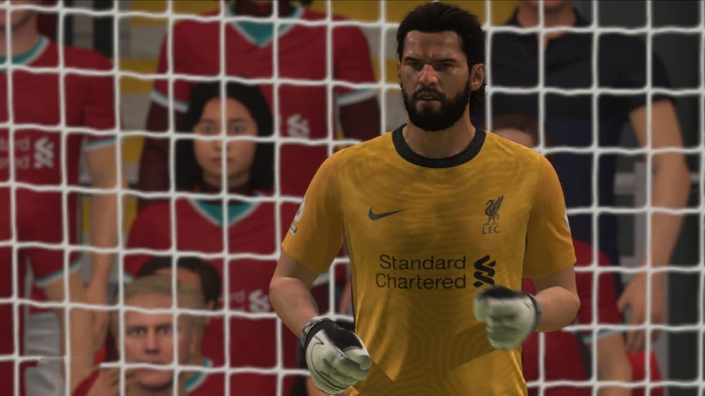 Allison Becker Liverpool goalkeeper stands in FIFA 21 Ultimate Team goal.