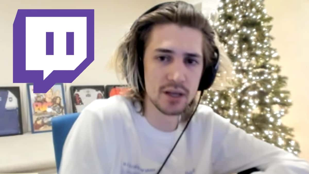 xQc in front of a tree with lights on, next to the Twitch logo