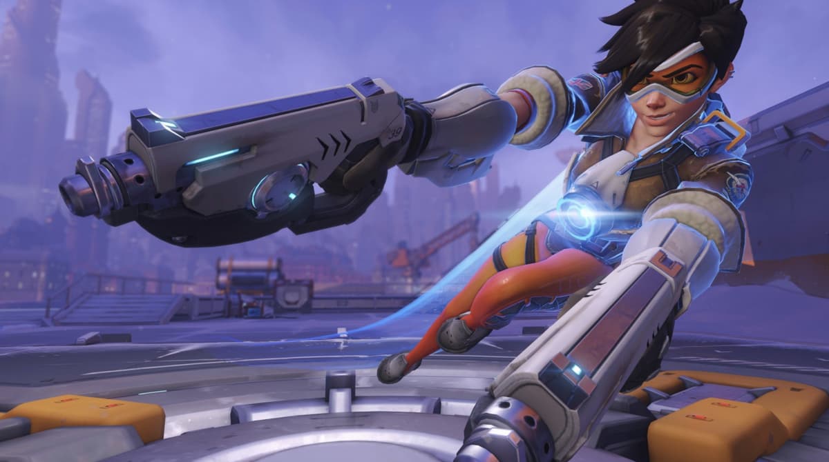 Screenshot of Overwatch mascot Tracer zipping into battle.