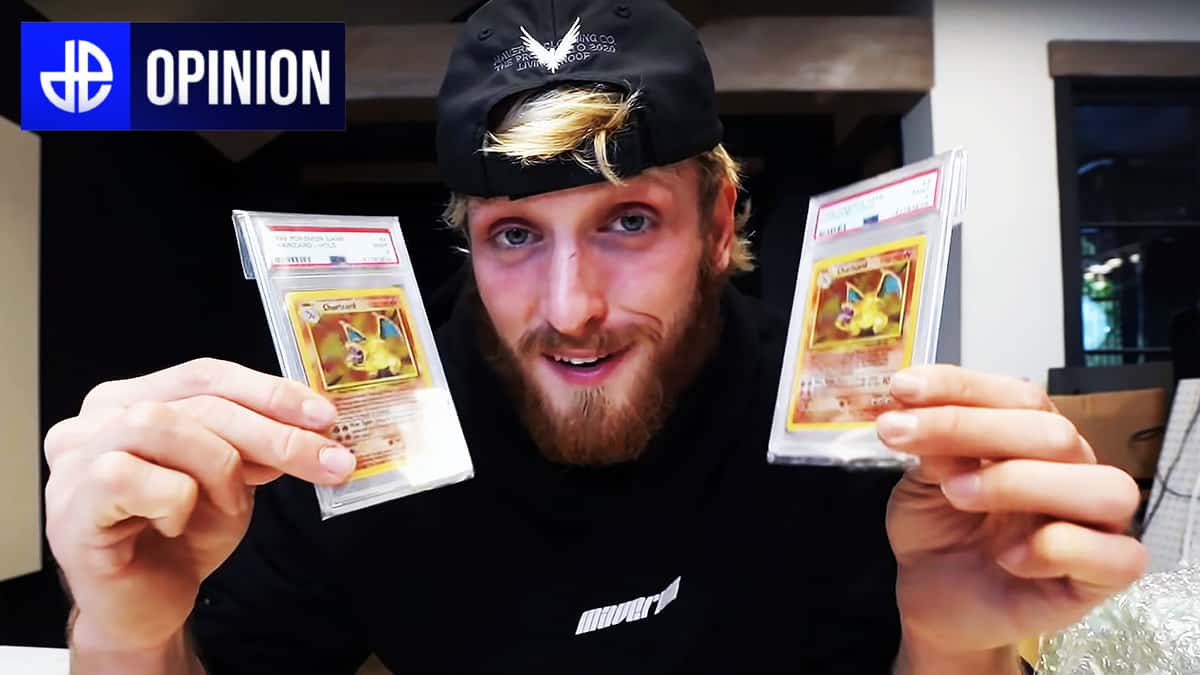 logan paul posing with charizard cards