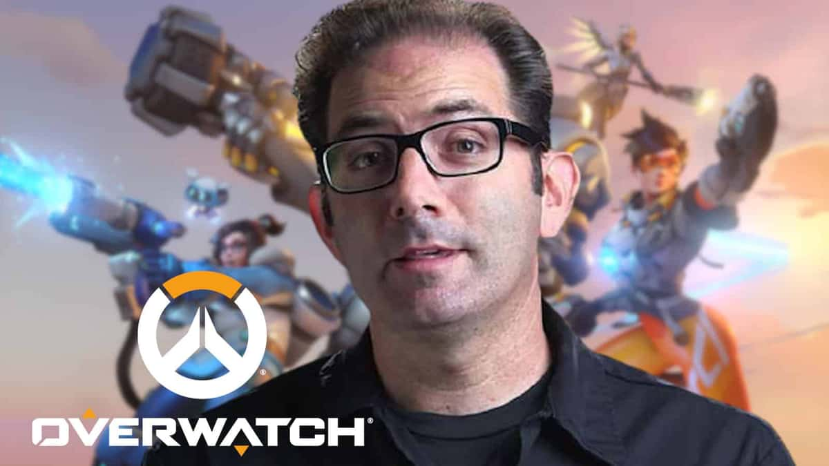 Jeff Kaplan in front of Overwatch 2 art