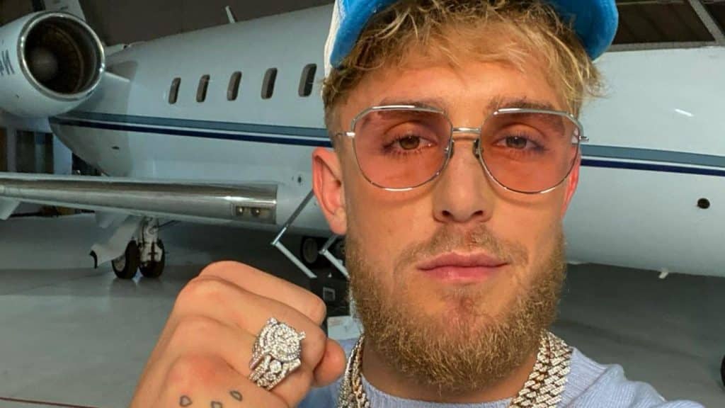 Jake Paul boards a plane