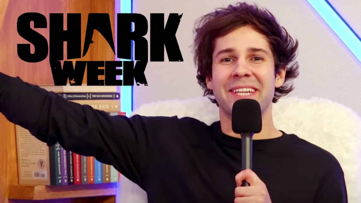 David Dobrik next to the Shark Week logo