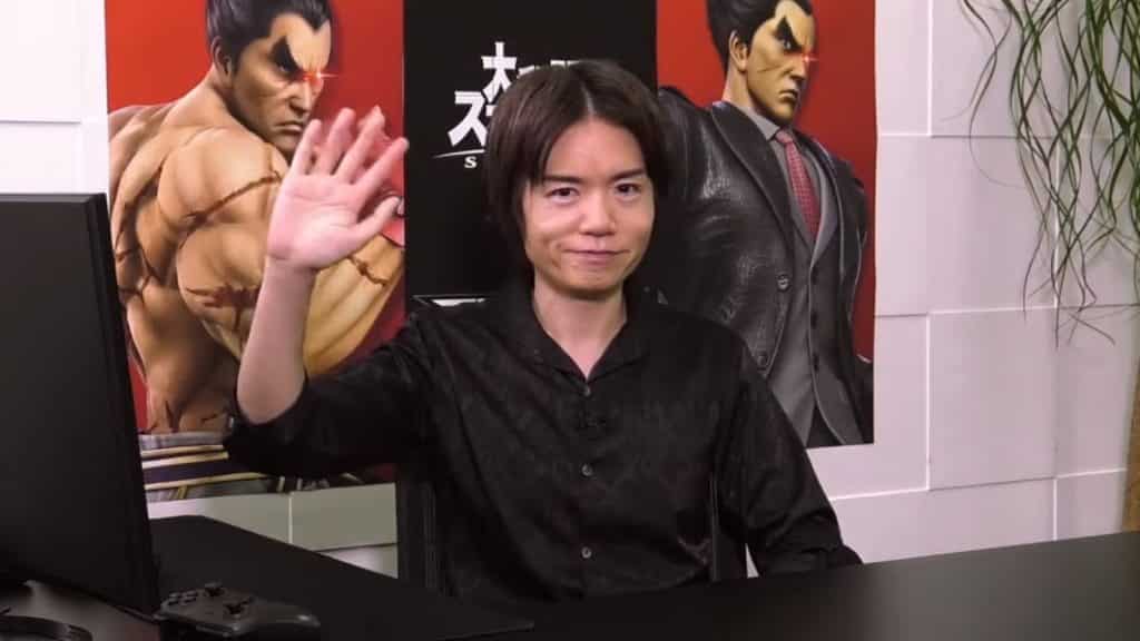 Sakurai waves to camera