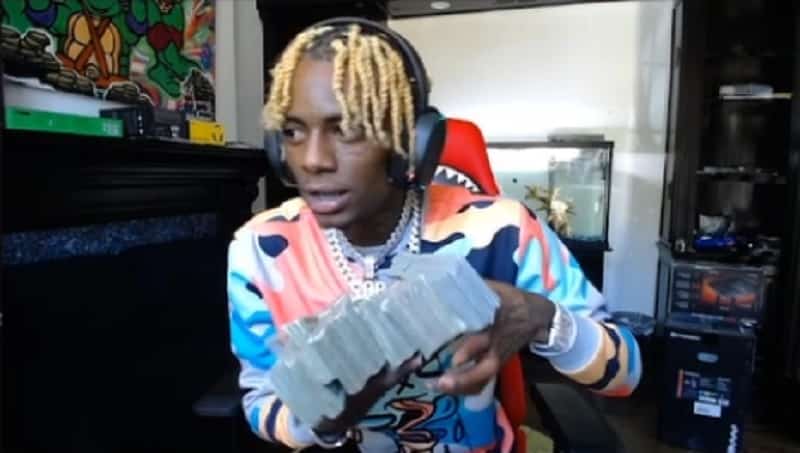 Souljaboy holds one milliion dollars