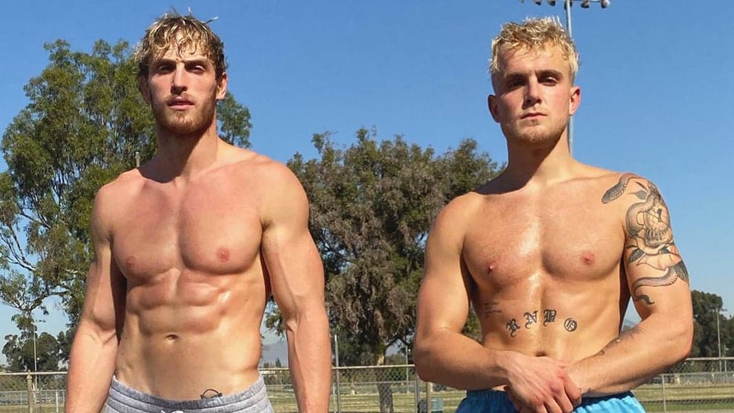 Logan Paul and Jake Paul pose outside