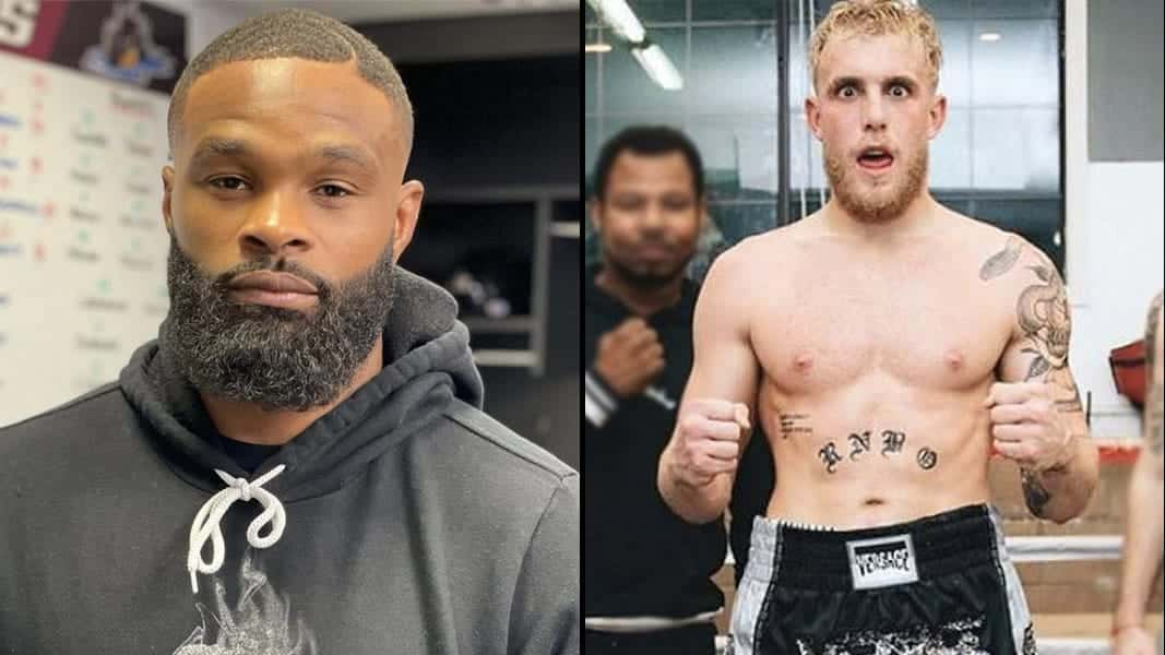 Tyron Woodley alongside Jake Paul in boxing gear