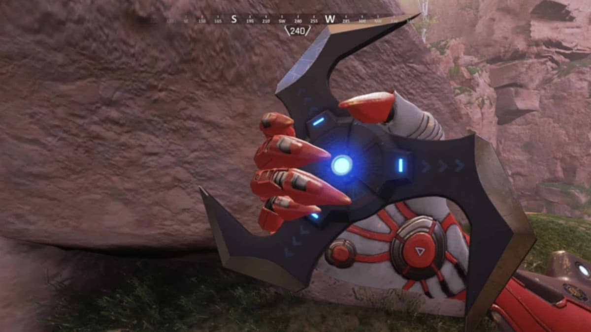 Apex Legends character inspecting Arc Star grenade