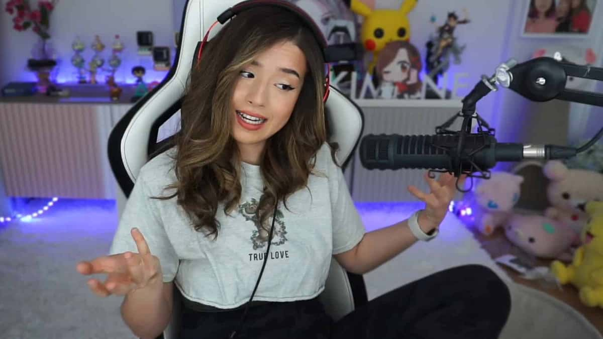 Pokimane shrugs on Twitch stream.