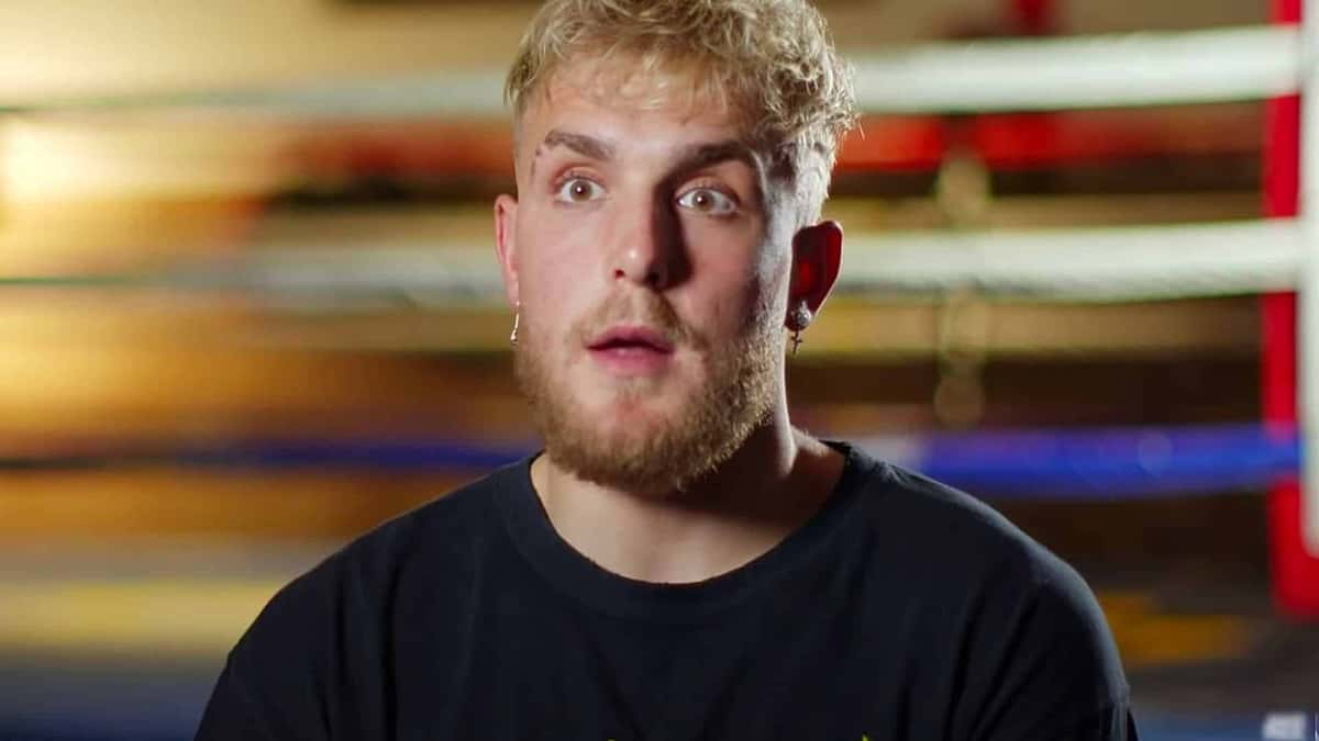 Jake Paul talking to camera inside boxing ring