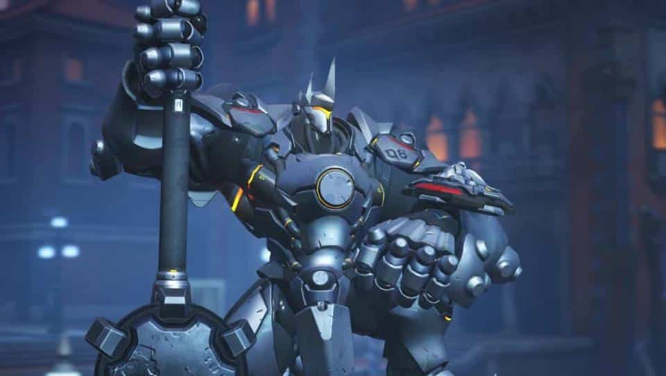 overwatch reinhardt poses with hammer