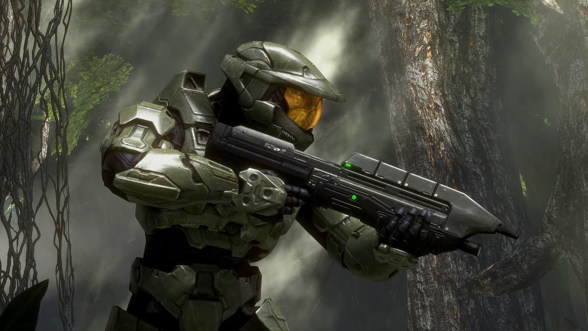 halo master chief walking through jungle with gun