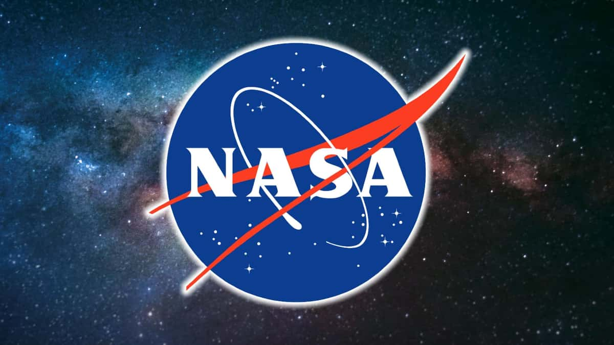 NASA logo in front of a galaxy