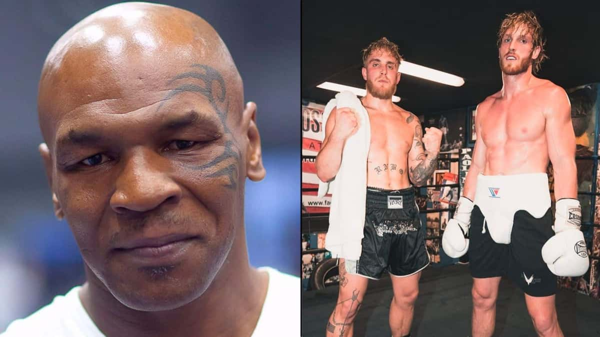 Mike Tyson alongside Jake and Logan Paul in boxing gear