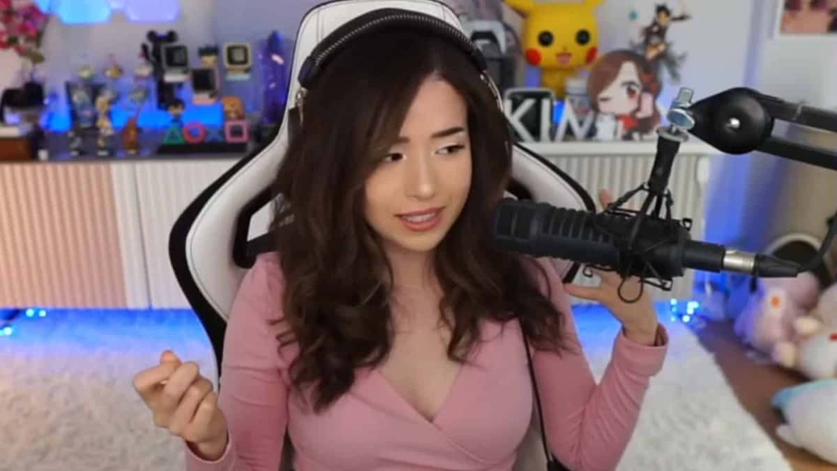 Pokimane gesturing with hands on twitch stream