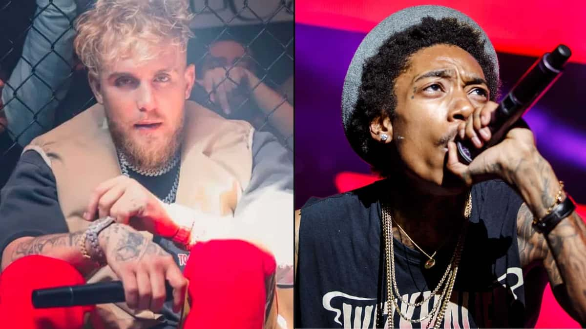 Jake Paul and Wiz Khalifa holding mics