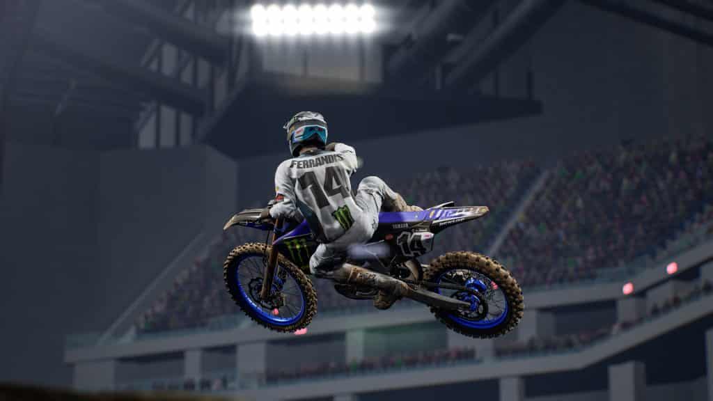 Monster Energy Supercross 5 screenshot showing a line of racers