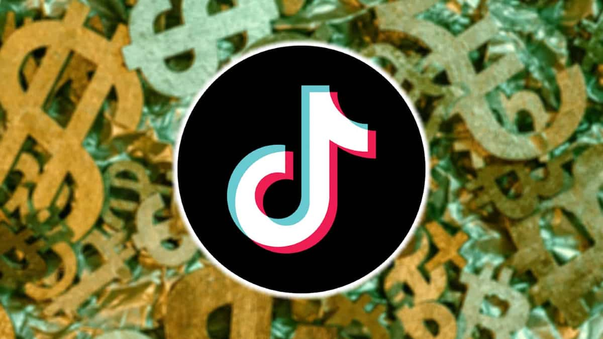 TikTok logo in front of money