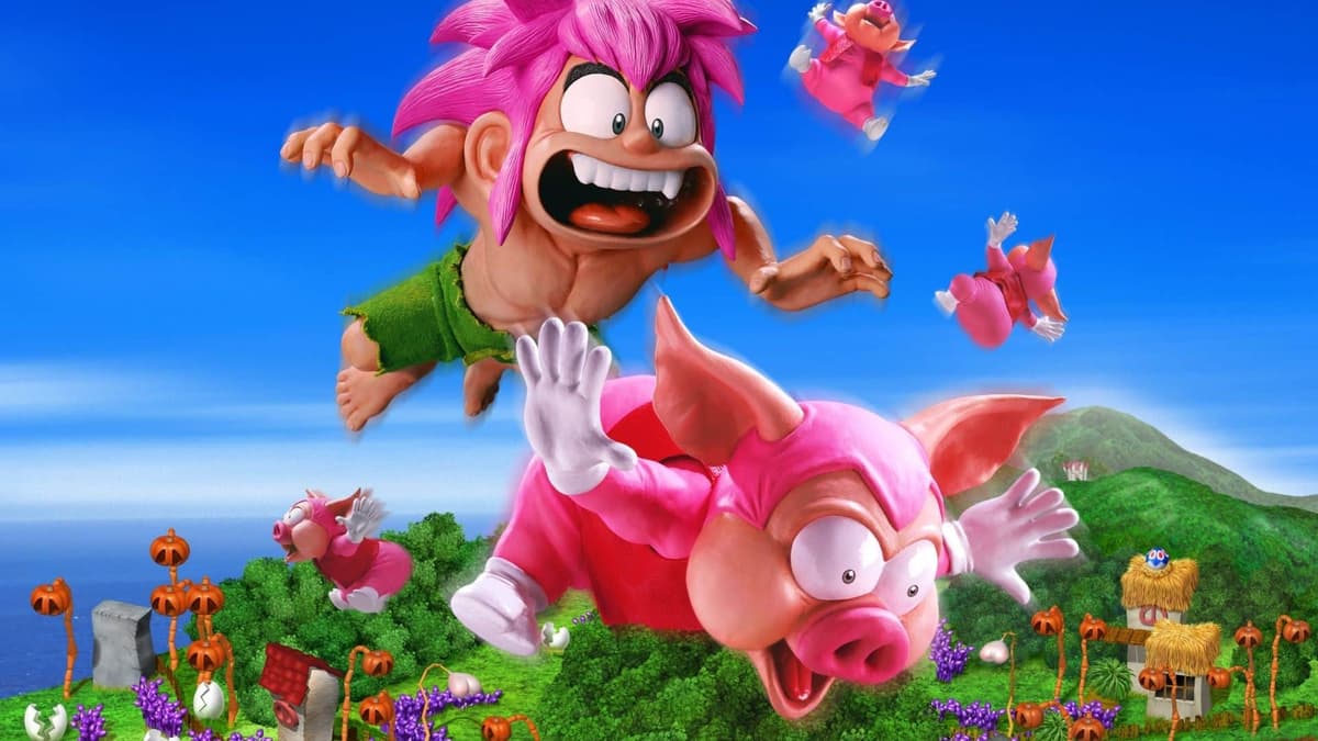 Tombi biting pig