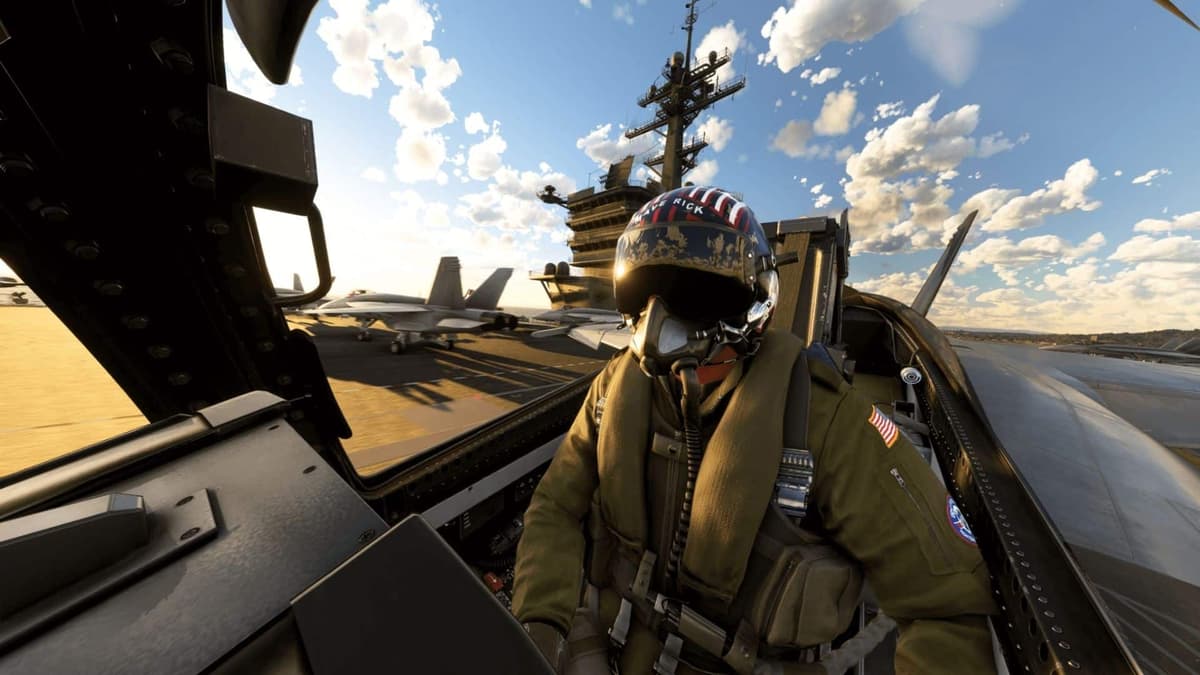 pilot sitting in their seat of top gun plane in flight simulator