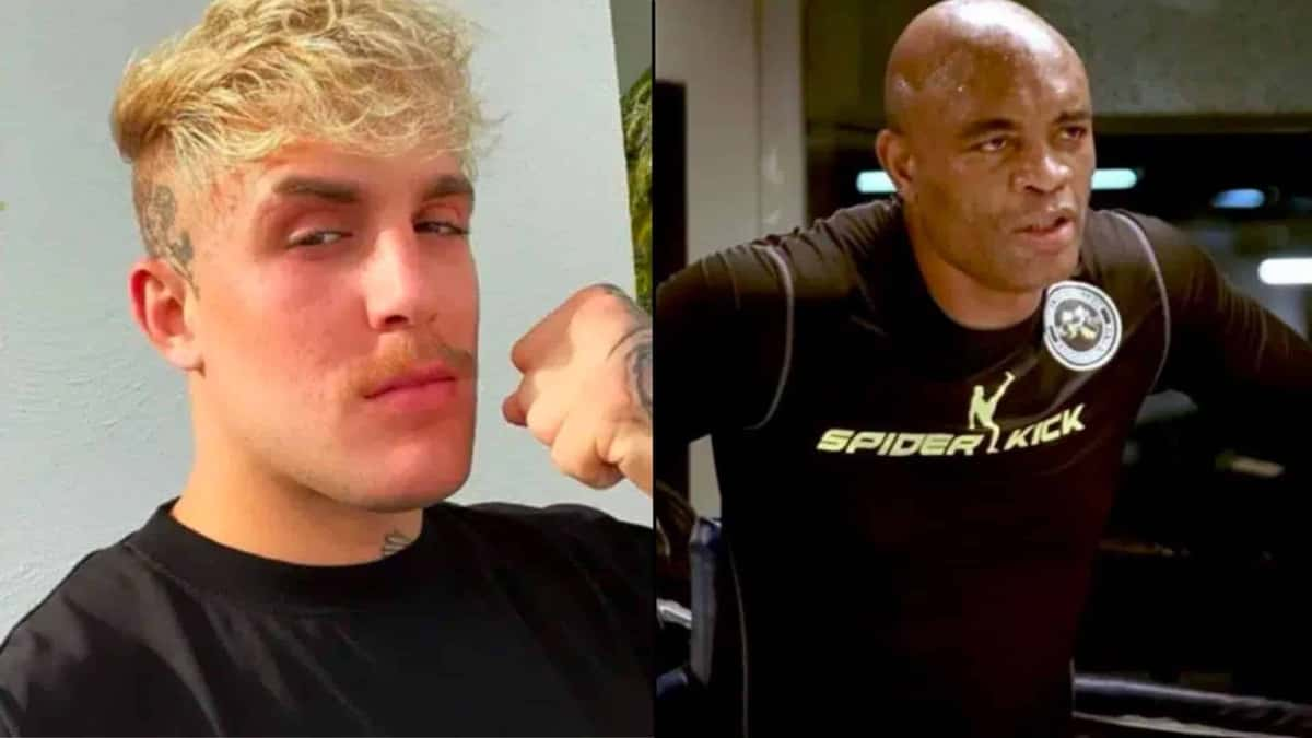 Jake Paul making fist alongisde Anderson Silva in boxing ring