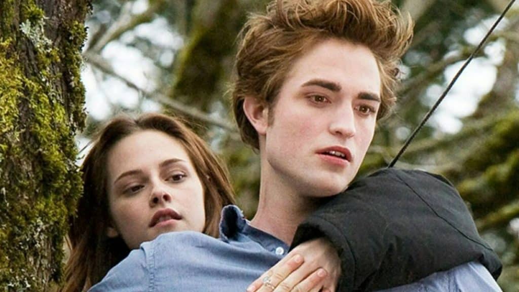 Bella holds onto edward in Twilight, the first movie in order of release for the franchise