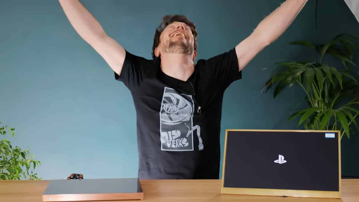 YouTuber DIY Perks celebrates after building a DIY PS5 Slim console